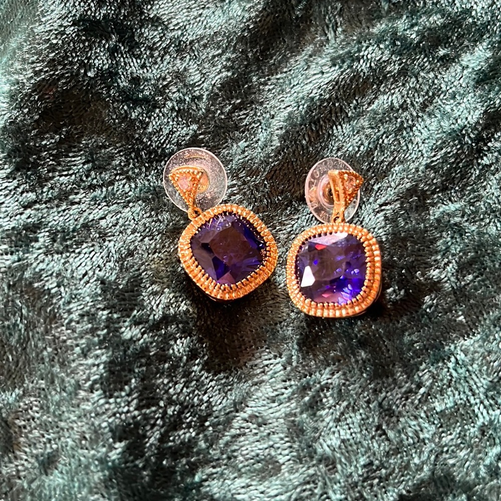 Earrings with blue stone posts